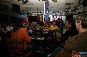In the round at the Bluebird Cafe in Nashville. Lari White is singing to Vince Gill as Ashley Cleveland looks on. photo by Lynnette at TheFunTimesGuide.com bluebird-cafe-in-the-round.jpg