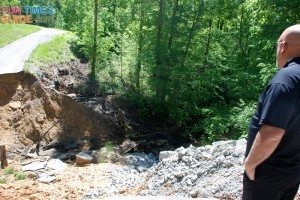 This is what we saw when we drove out to our Leiper's Fork property a couple days after the Nashville Flood. The road had washed away and there was no way to get to our property! photo by Lynnette at TheFunTimesGuide.com leipers-fork-road-washout