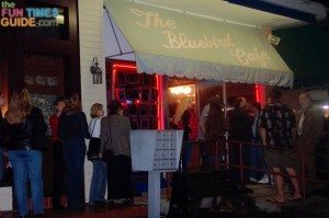 There's ALWAYS a long line to get into the Bluebird Cafe. There's only 200 seats, so lots of people stand inside as well. photo by Lynnette at TheFunTimesGuide.com bluebird-cafe-nashville.jpg