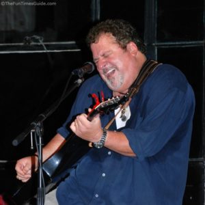 Bob DiPiero playing guitar