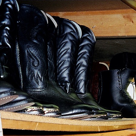 Cowboy boots on a shelf.  Photo Ã‚Â©2004 Jim & Lynnette's Fun Times Guide //thefuntimesguide.com