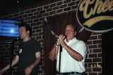 Don Ellis - left - the emcee at a Nashville karaoke bar.