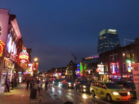 Nashville at night - downtown honky tonks and neon lights.