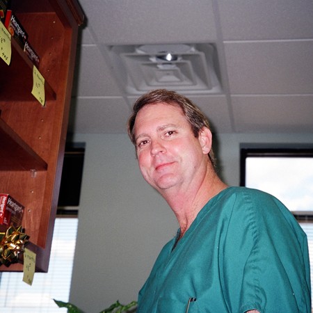 Dr. Jones in his vet garb at Cool Springs Animal Hospital.