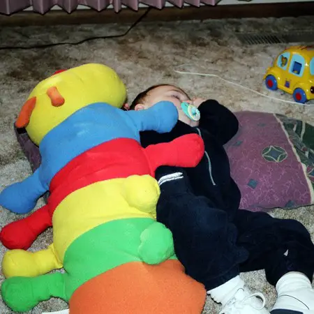 Dylan sleeping next to one of his favorite toys.