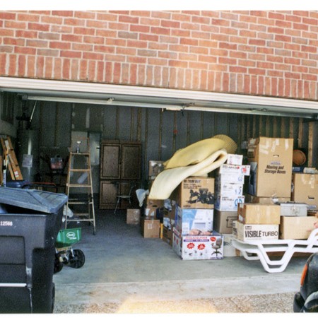 A garage full of stuff at our new house.