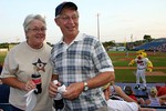 Georgia and Harlo at the Nashville Sounds baseball game with Ozzie the mascott in the background.