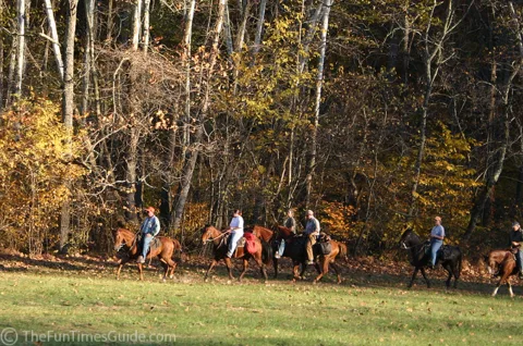 Horses and people horseback riding along the Natchez Trace Parkway. photo by Lynnette at TheFunTimesGuide.com