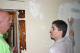 Jim and David discussing the drywall situation -- and what needed re-patched prior to painting.