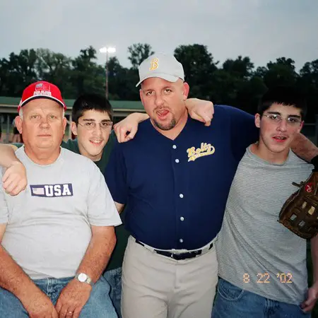 Jim's dad, Benjamin and James at Jim's softball game.