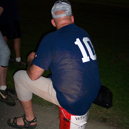 Jim sitting on a bucket of whoop ass.