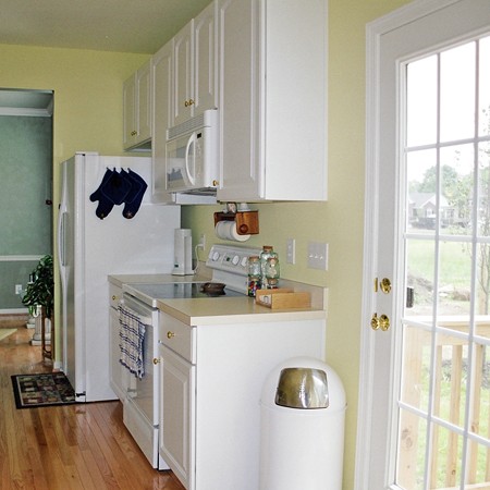 A view of the kitchen toward the back door.