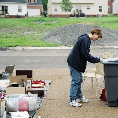 Lynnette marking down items at the yard sale - everything had to go!