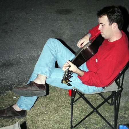 Mike playing the guitar after the races in San Antonio.