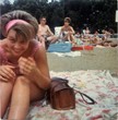 Back in the day when mom would wear shorts... even a swimming suit, no less! Mom on the beach.