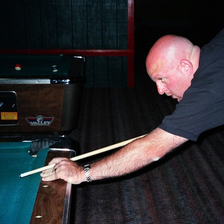 Jim playing pool at Denim & Diamonds in Nashville.