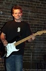 Ryan Murphy playing guitar at BB King's in Nashville.