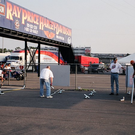 Setting up the tent for our booth from scratch.