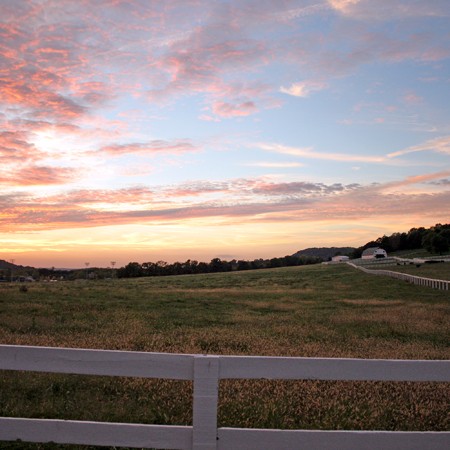 A farm with white picket fence. Photo Ã‚Â©2004 Jim & Lynnette's Fun Times Guide //thefuntimesguide.com